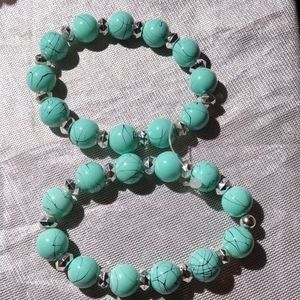 2 women turquoise bracelet